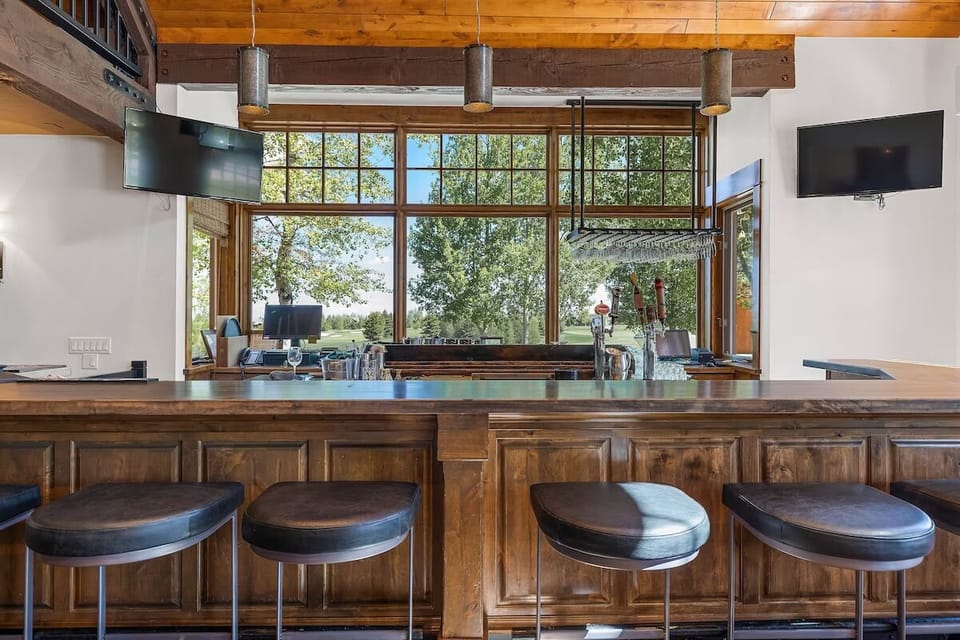 Pull up a stool and toast the view at sunset.
