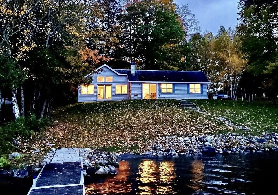 Warm glow of house at dusk