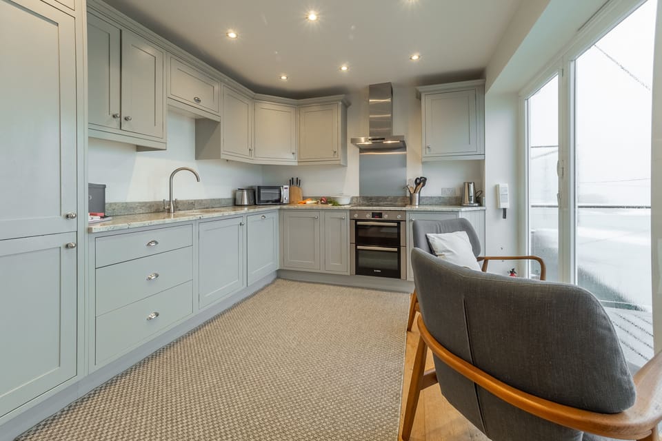 Westaway, Portreath. Second floor: Modern kitchen with panoramic sea views of Portreath
