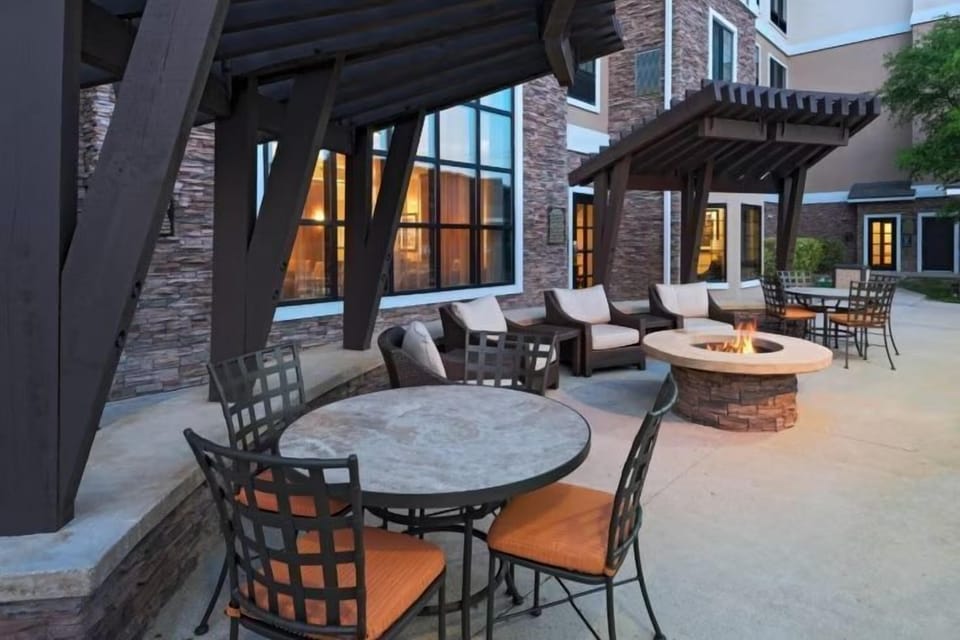 Gather around the on-site outdoor fire pit and courtyard seating area.