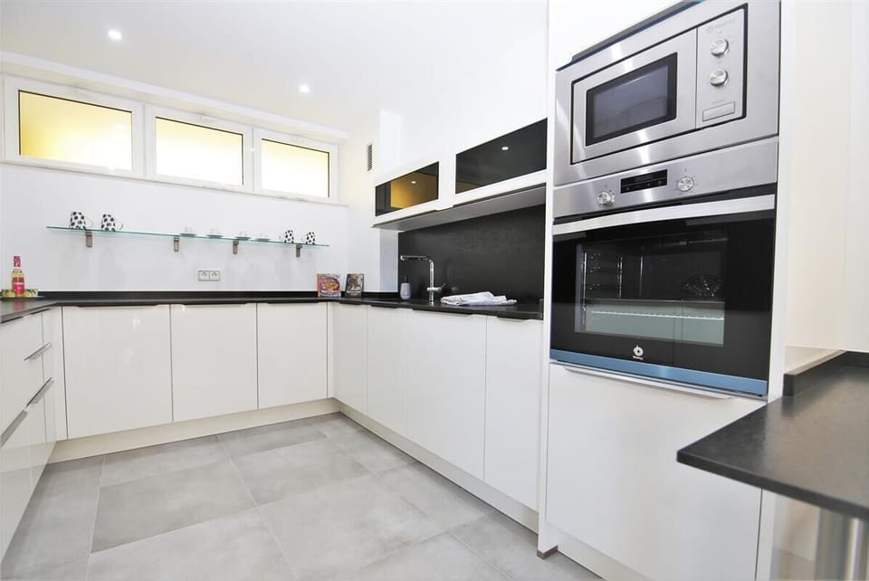 Modern kitchen is fully equipped with all the appliances