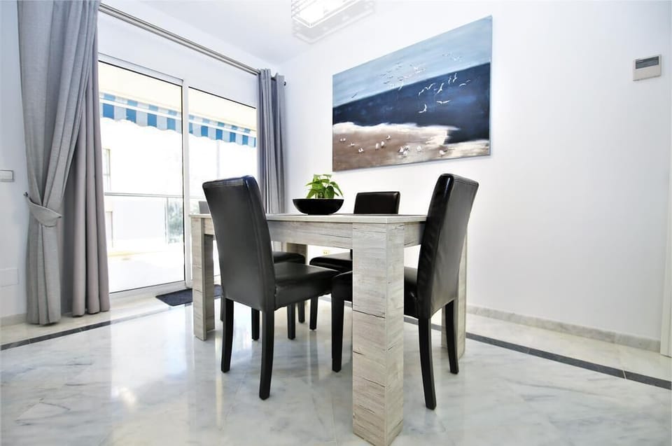 Modern dining area with seating for four