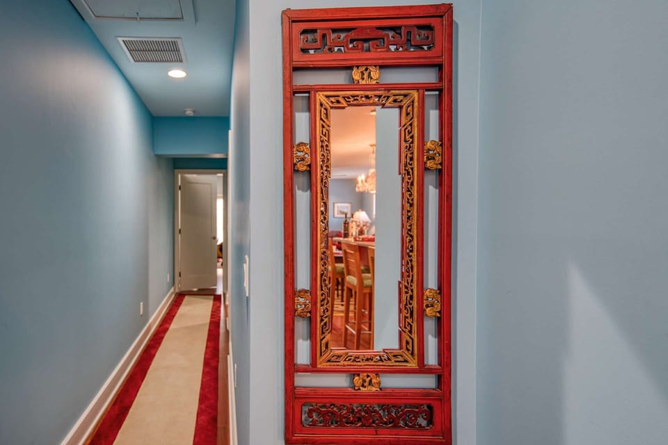 The hallway takes you to the two bedrooms and two full bathrooms.