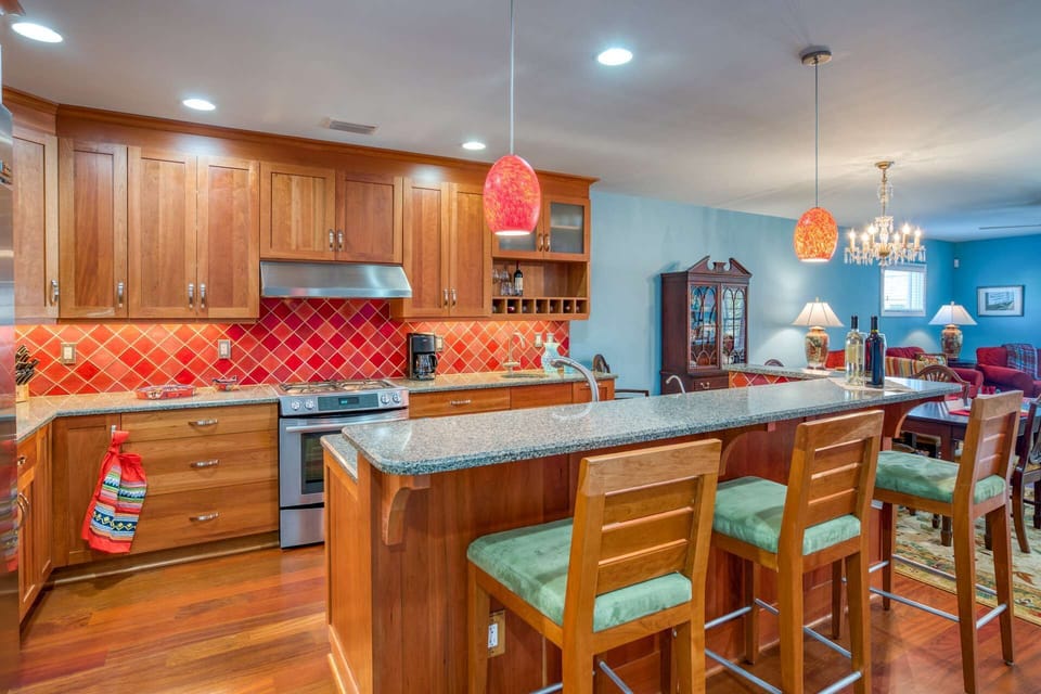 The large gourmet kitchen is the heart of this apartment.