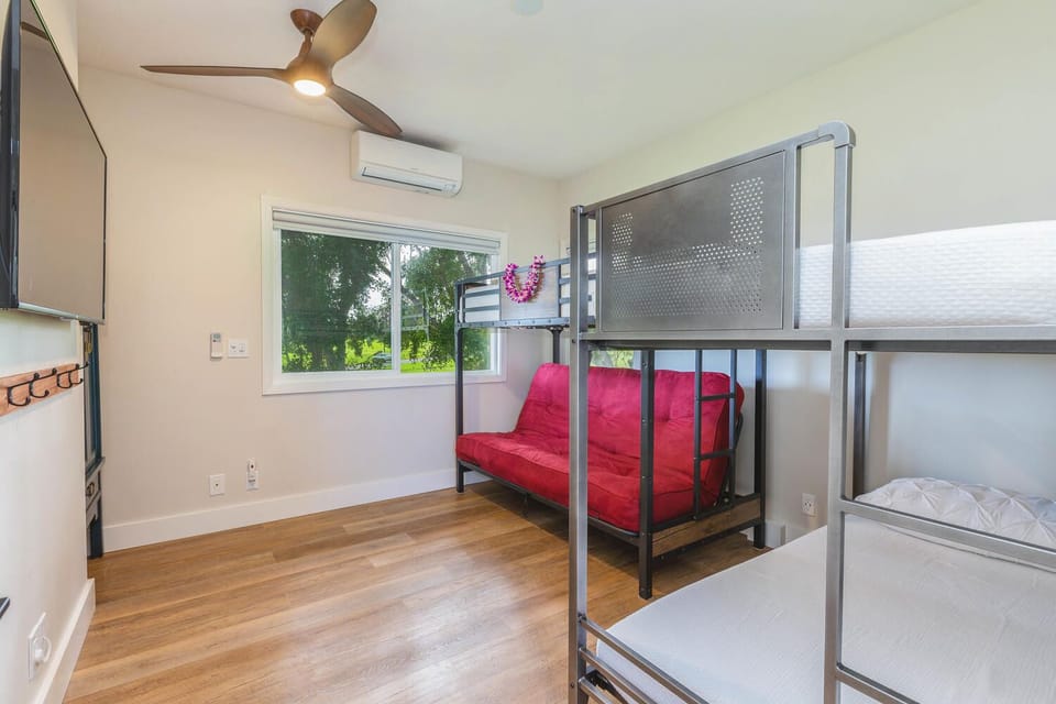 Three twin beds and a futon