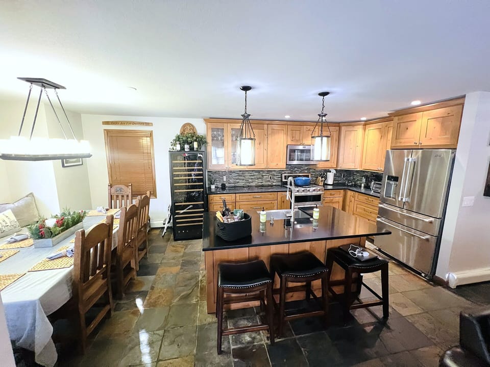 Fully stocked kitchen adjoining the dining area 