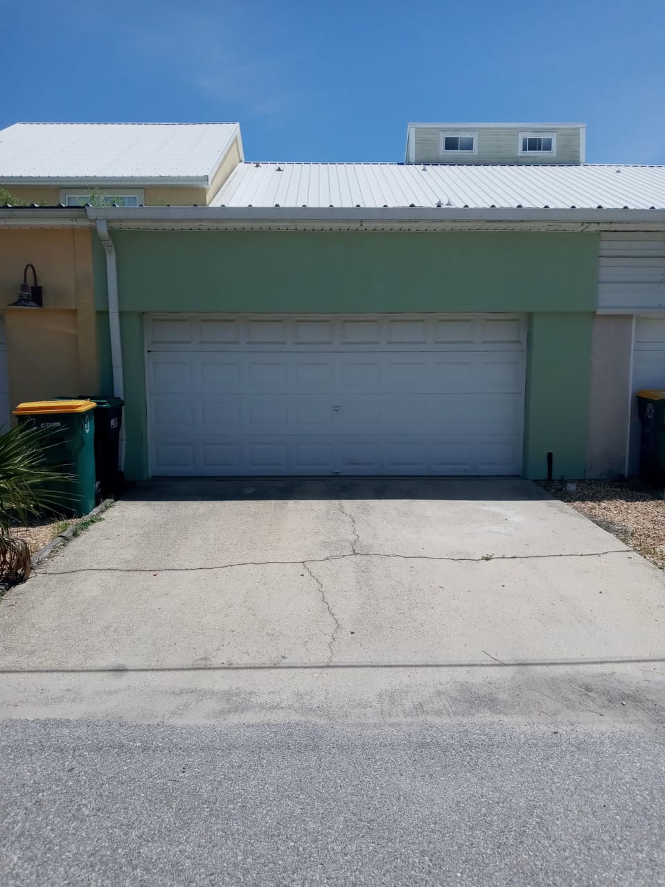 private 2 car garage parking at the rear avenue