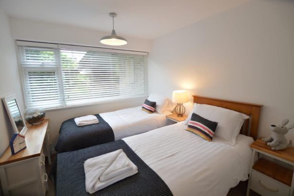 Foreshore At Fistral, Newquay. Ground floor: Bedroom two with twin single beds