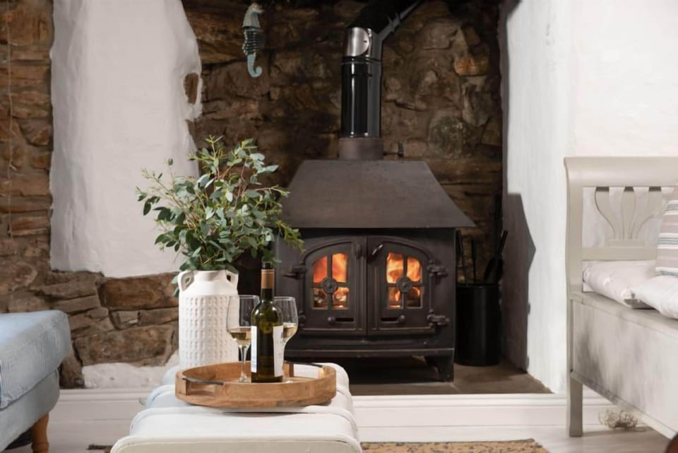 Roseneath, St Agnes. Ground floor: Snug with cosy wood burning stove