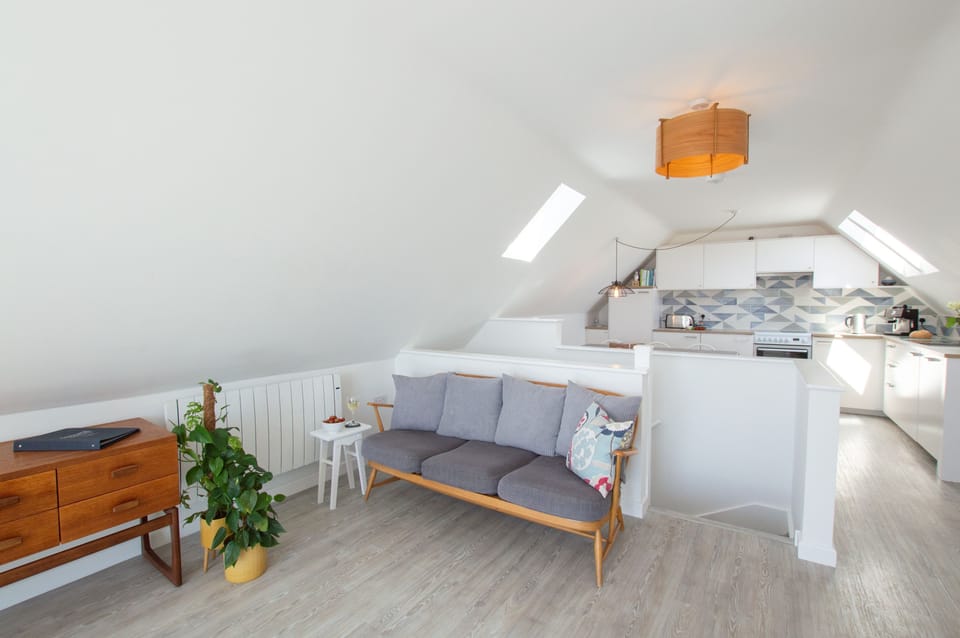 Sunfish, Porthtowan. First floor: Sitting room with television and Juliet balcony