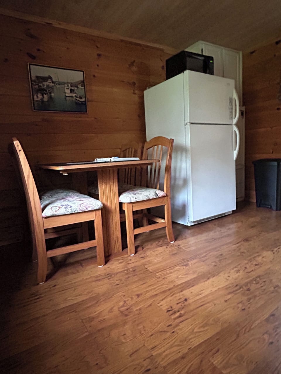 Table w/ 4 chairs, refrigerator, brita (new filter every 3 mths) microwave 