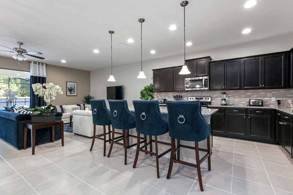 Classy barstool seating facing the kitchen