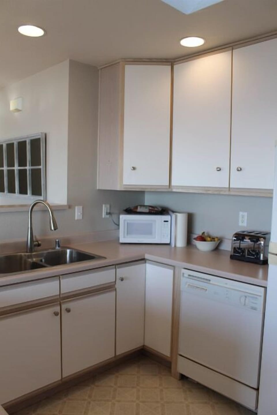 Microwave, dishwasher, double sink, toaster, 