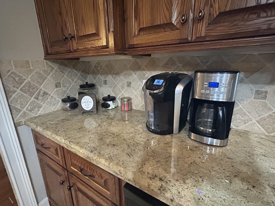 Coffee bar with Keurig and standard coffee maker.