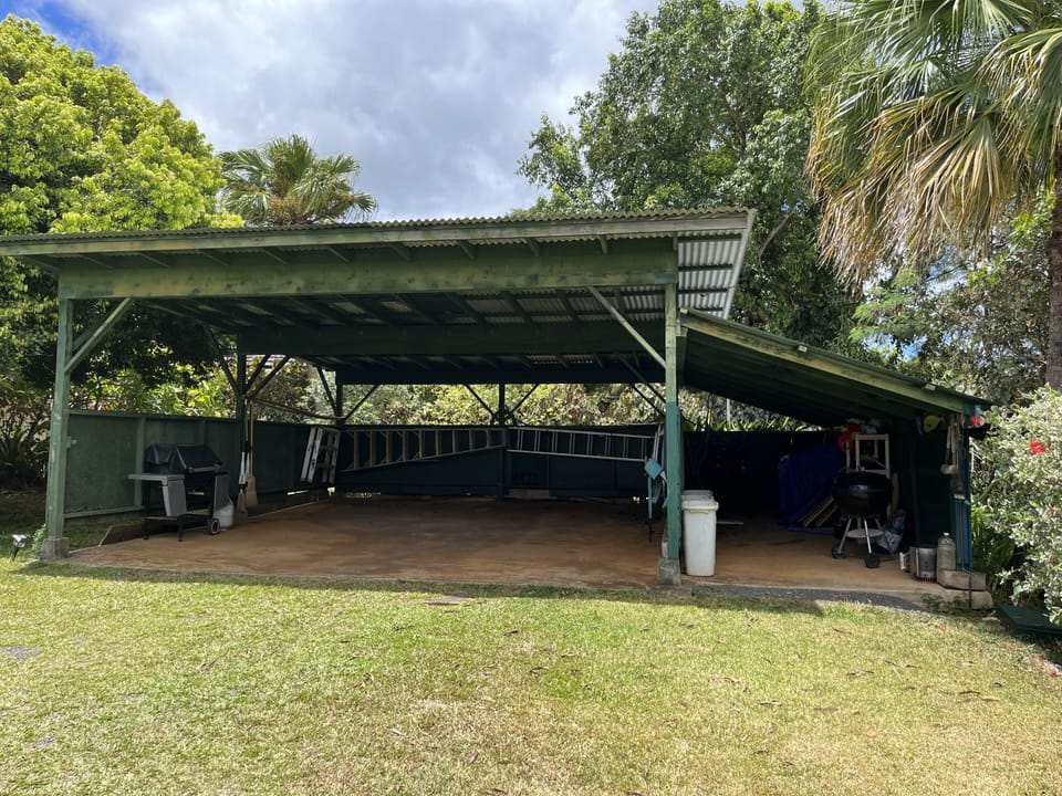 Car port with beach accessories