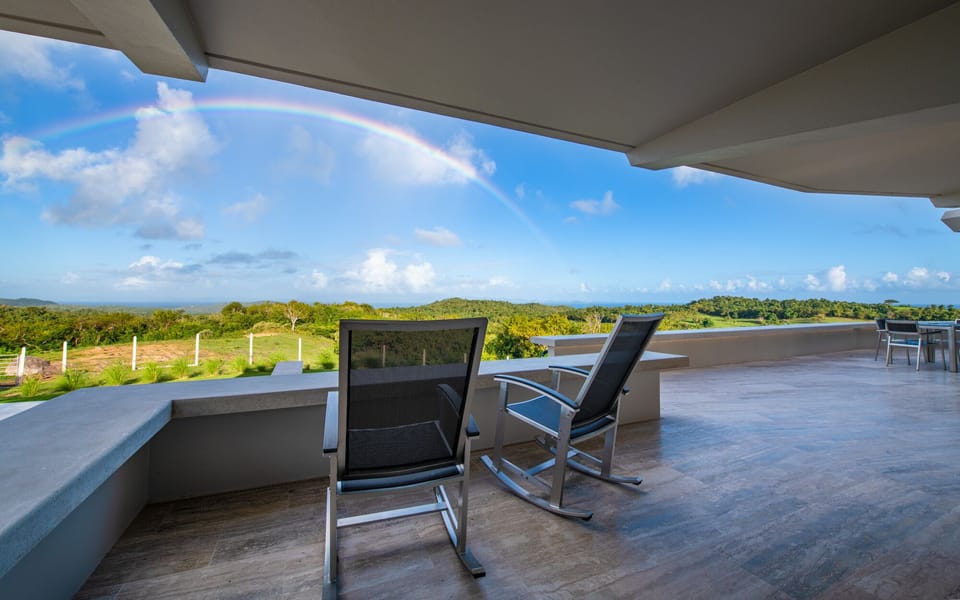 Panoramic rainbows are a common site at Casa Limones