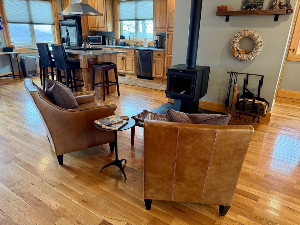 Wood burning stove seating area in Living Room