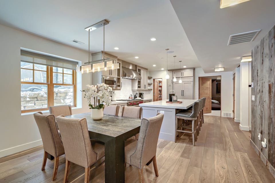Your open-concept living space blends natural light, mountain breezes, and modern comforts—where every meal feels like a gathering and the kitchen invites you to cook, laugh, and savor your alpine escape.