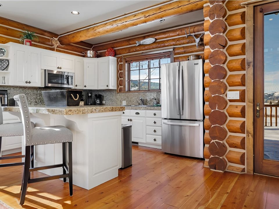 Cook with ease in the bright kitchen beside mountain light.