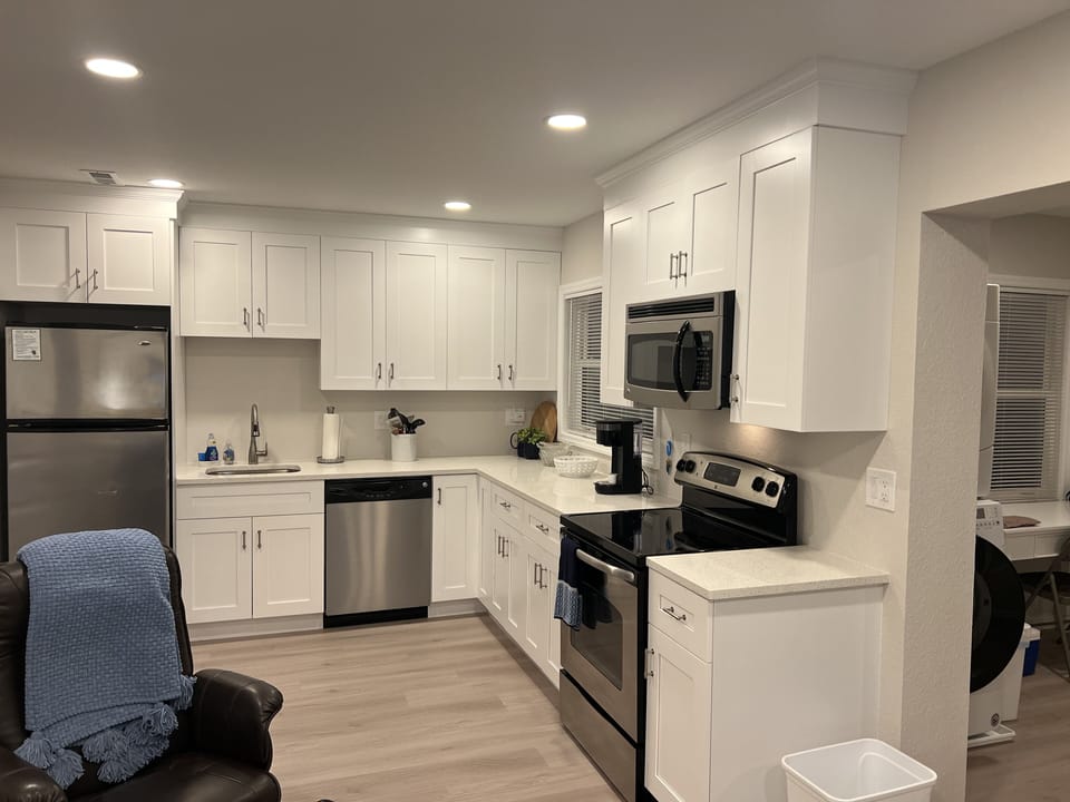 condo is all new!
Shaker cabinets, stainless appliances, quartz countertops