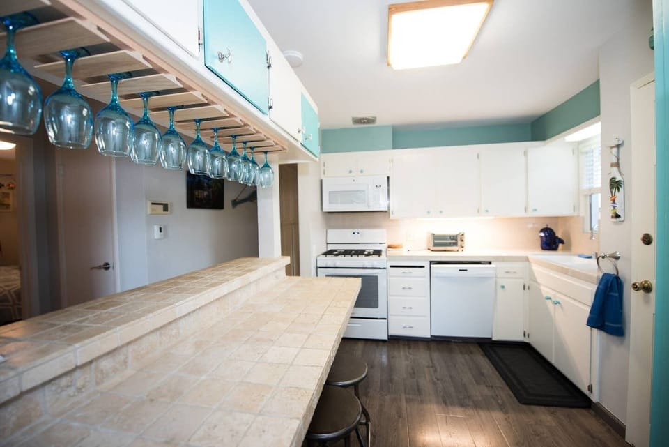 The refreshed kitchen includes a brand new range and microwave.