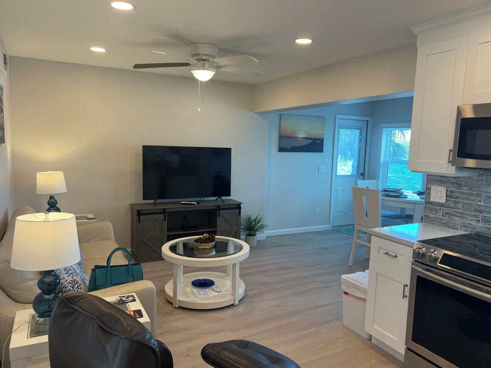 Comfy living room with 55" tv and water views