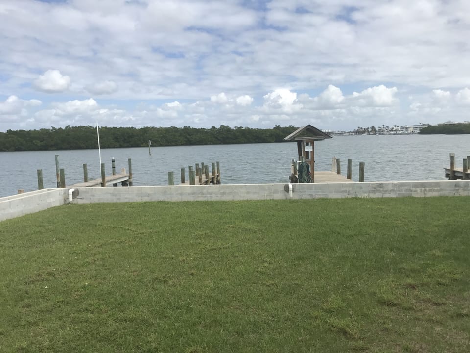 Quiet green space area  between our condo and the docks