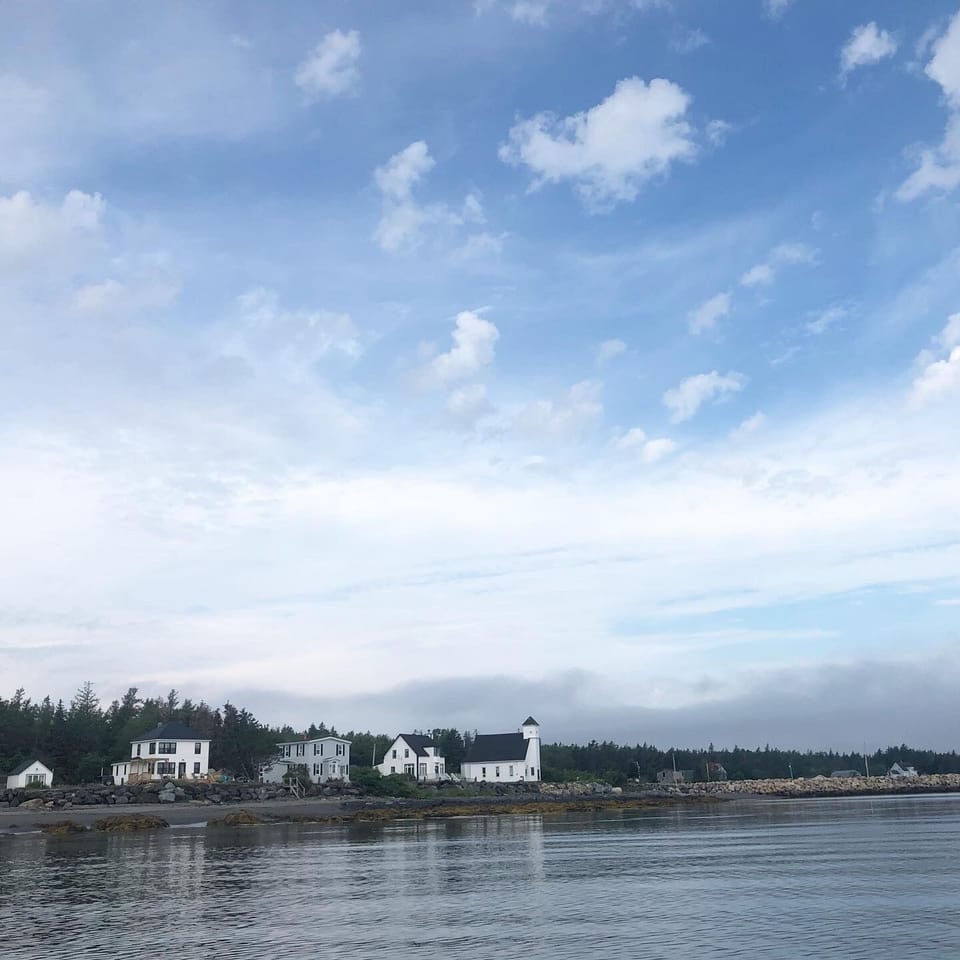 The view of the house, and neighbouring church from the water.