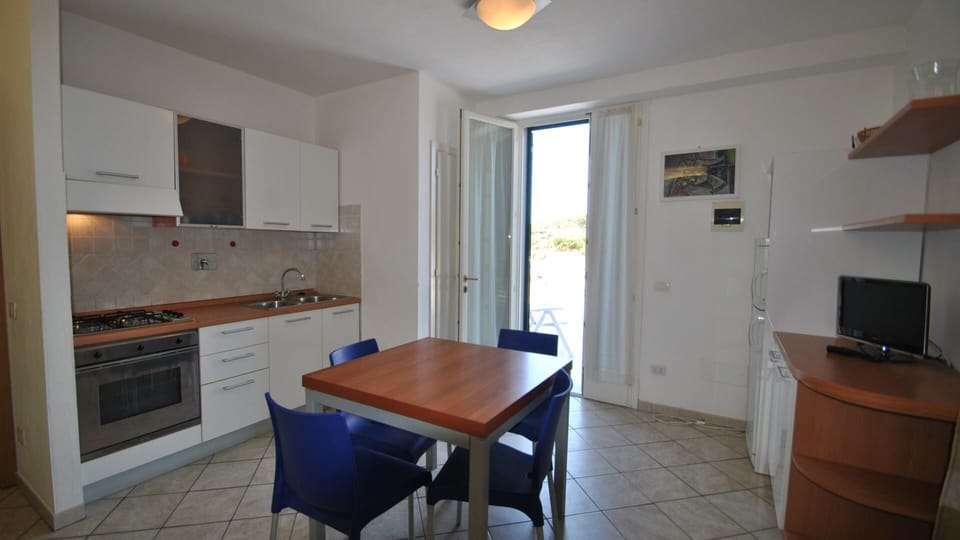 living room with kitchnette and sofa bed