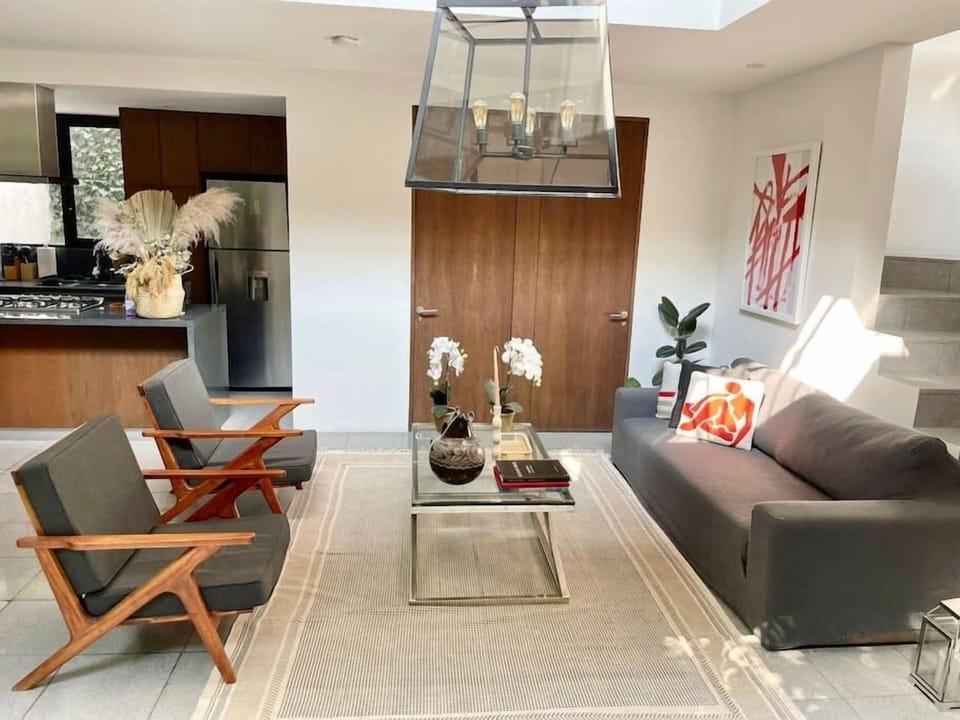 The doors in the back are the laundry room on the left and the guest bathroom on the right. 