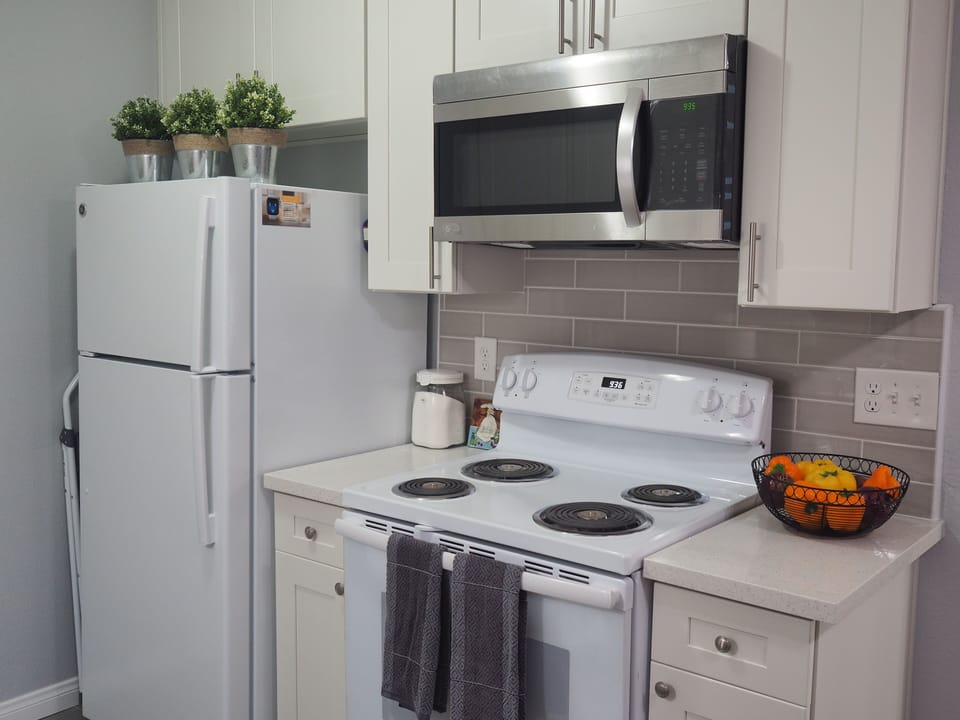 Electric stove; microwave oven