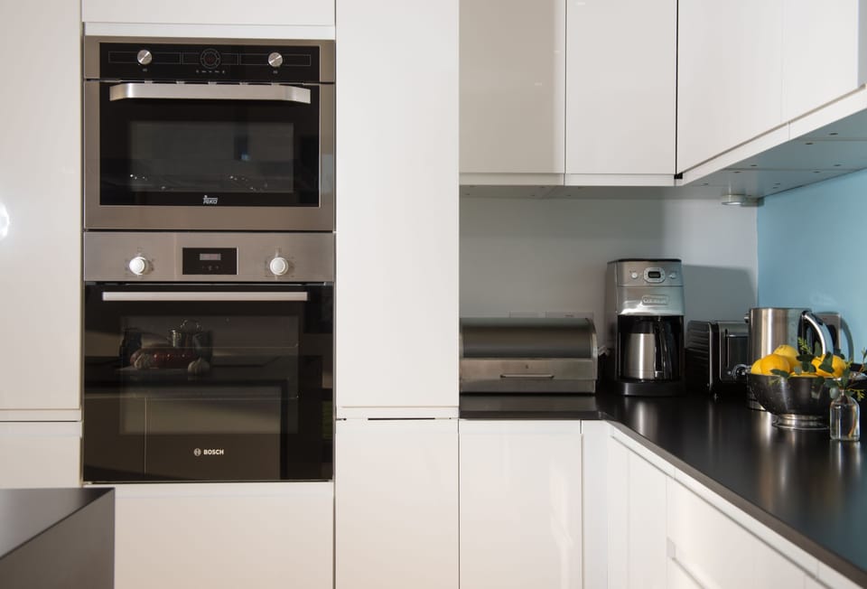 Wavelength, St Agnes: Modern kitchen area with a double electric oven