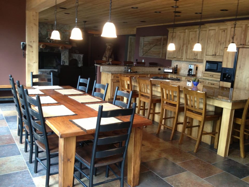 dining room table sits up to 12, island sits 6, counter sits 5