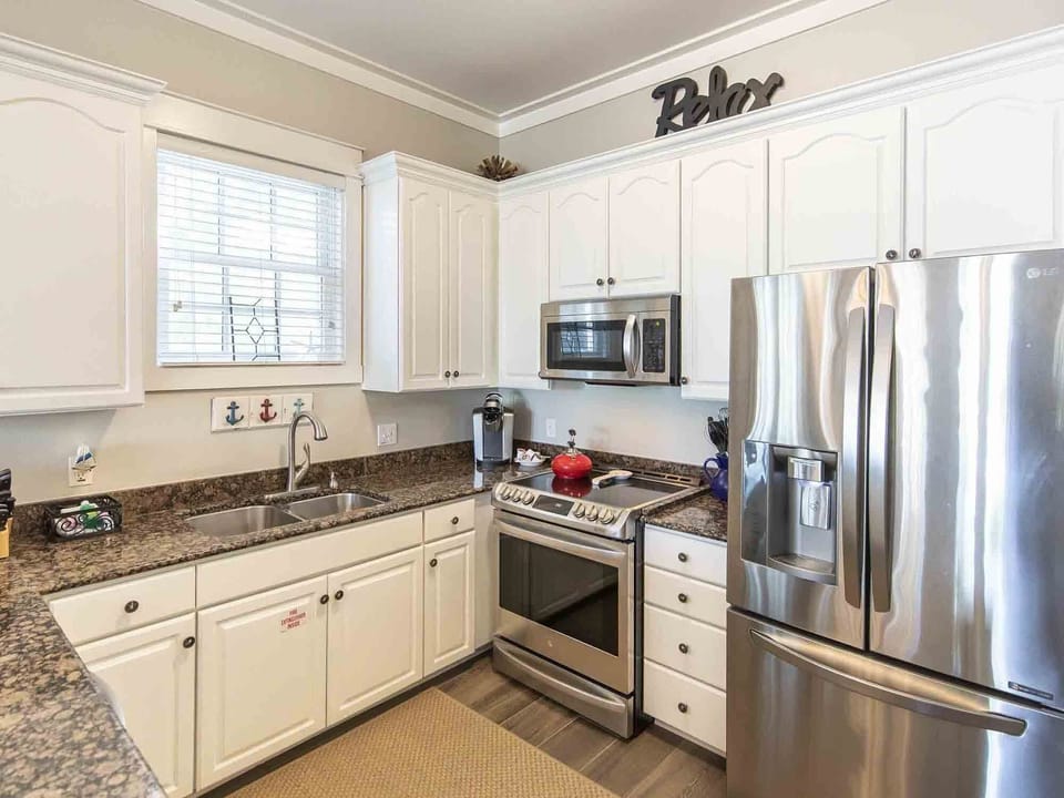 Our kitchen is fully stocked for cooking, grilling or mixing drinks!