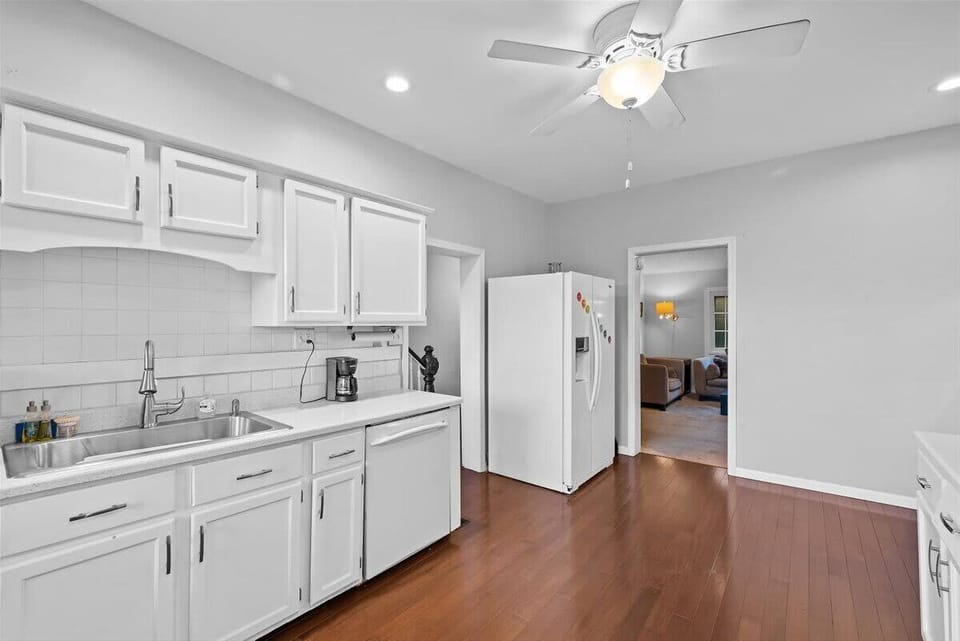 The kitchen is fully equipped, dishwasher, microwave, and range