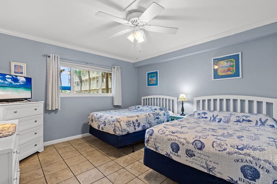 Guest room has 2 full size beds and is right next to main bathroom