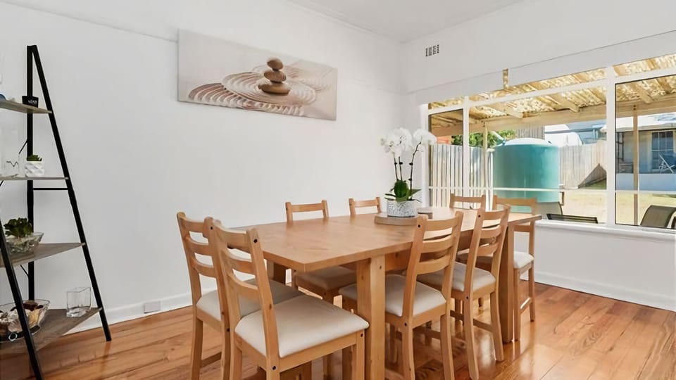 Open plan living/dining with generous dining table. 