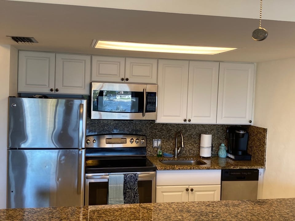 Fully equipped kitchen, blender, toaster, and your Kuerig coffee maker with pods