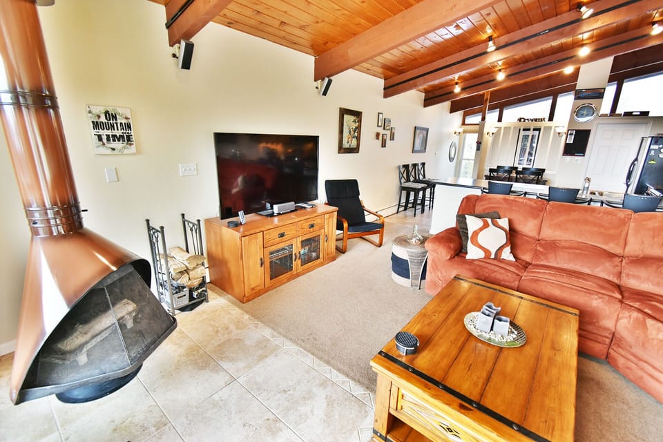 Living Room with Wood Fireplace - Living Room with Wood Fireplace