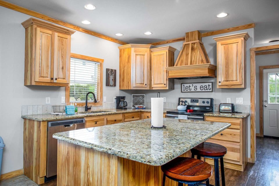 Your country kitchen is fully stocked with all the cooking ware, dining ware, glasses, and utensils you'll need for a family-style feast!