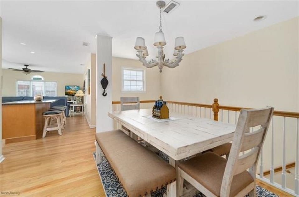 Dining room. Seating for at least 8 and extra chairs if needed. 