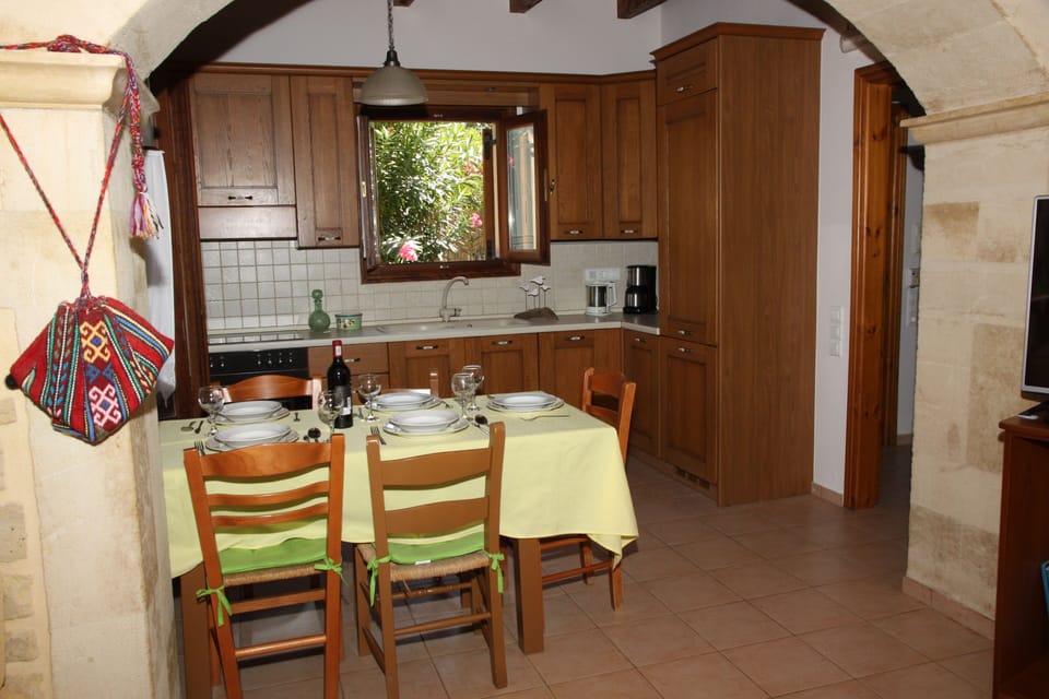 The kitchen with the inside dining area.