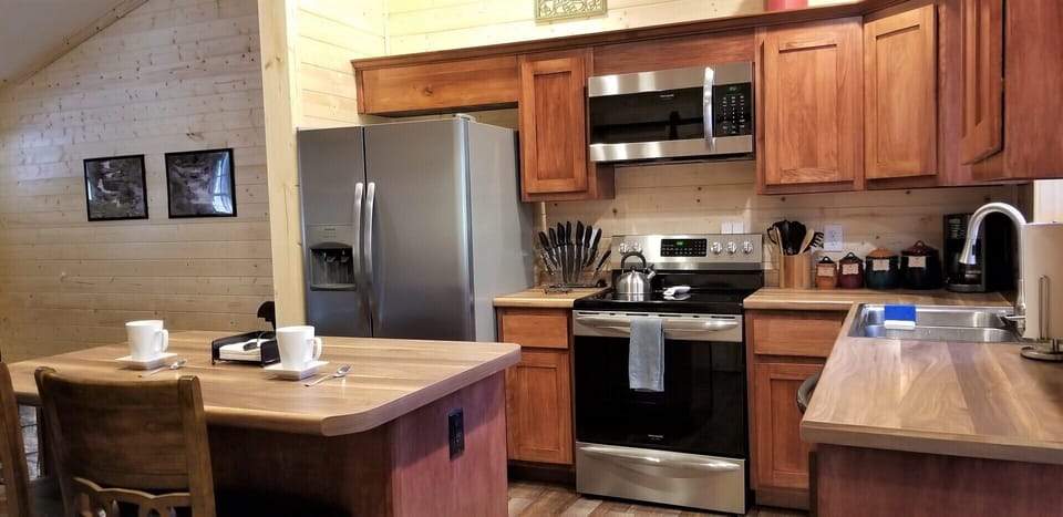 Refrigerator with filtered ice/water.  Microwave and self cleaning oven.