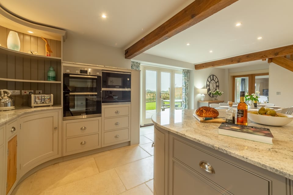 Ground floor: Kitchen is well-equipped and comes with granite work surfaces
