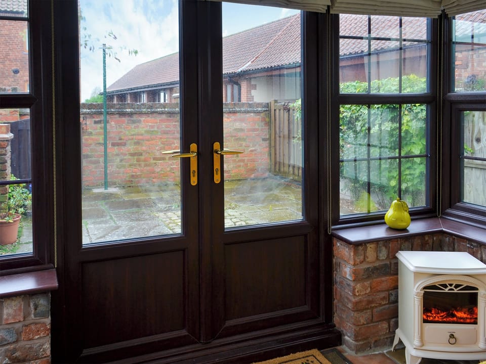 Conservatory leading to courtyard | Ikkle Cottage, Old Blidworth, near Ravenshead