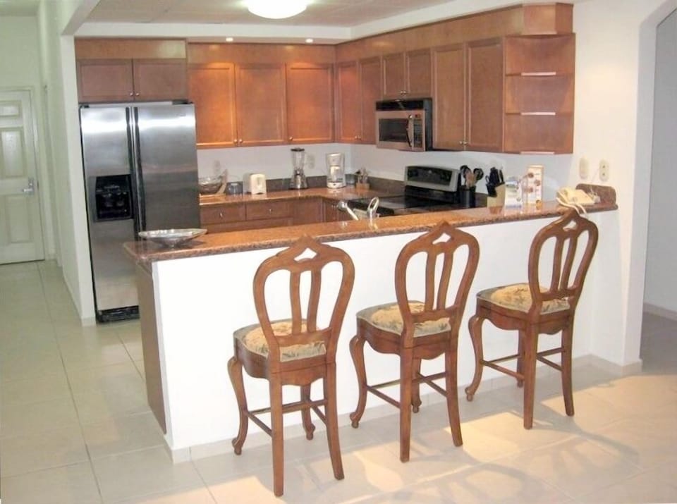 Spacious kitchen with eating bar