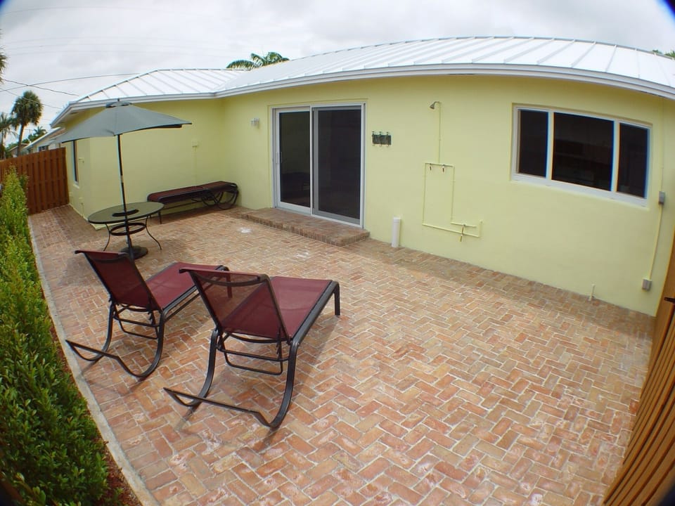 Private fenced in yard with hot and cold outdoor shower.