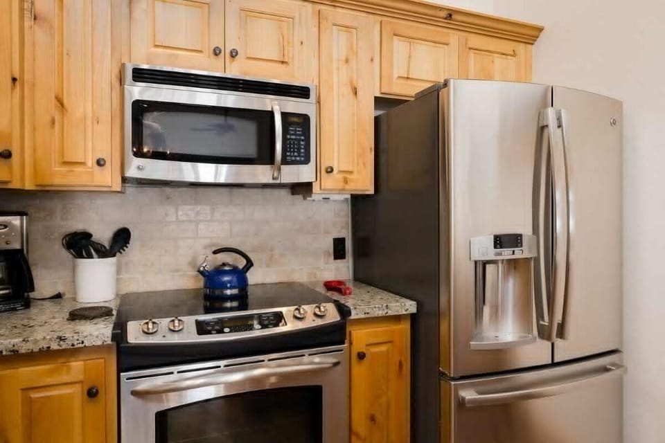 Cook together with spacious counters and full-size appliances.