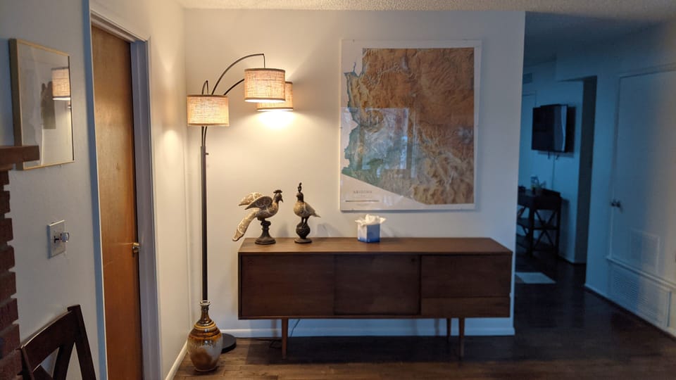 Spacious dining area with large topographic map of Arizona.