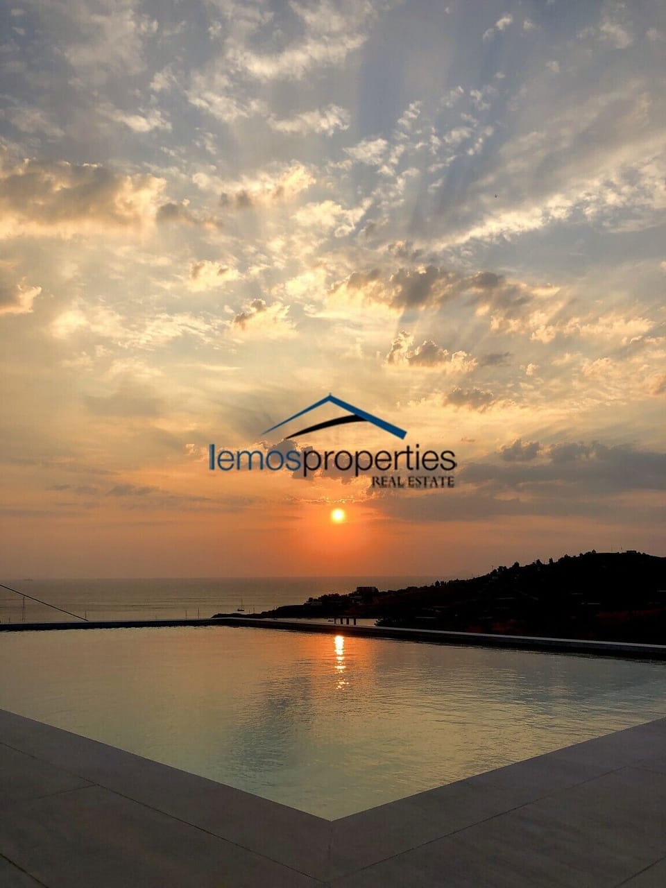 Relax by the pool and watch the sun go down